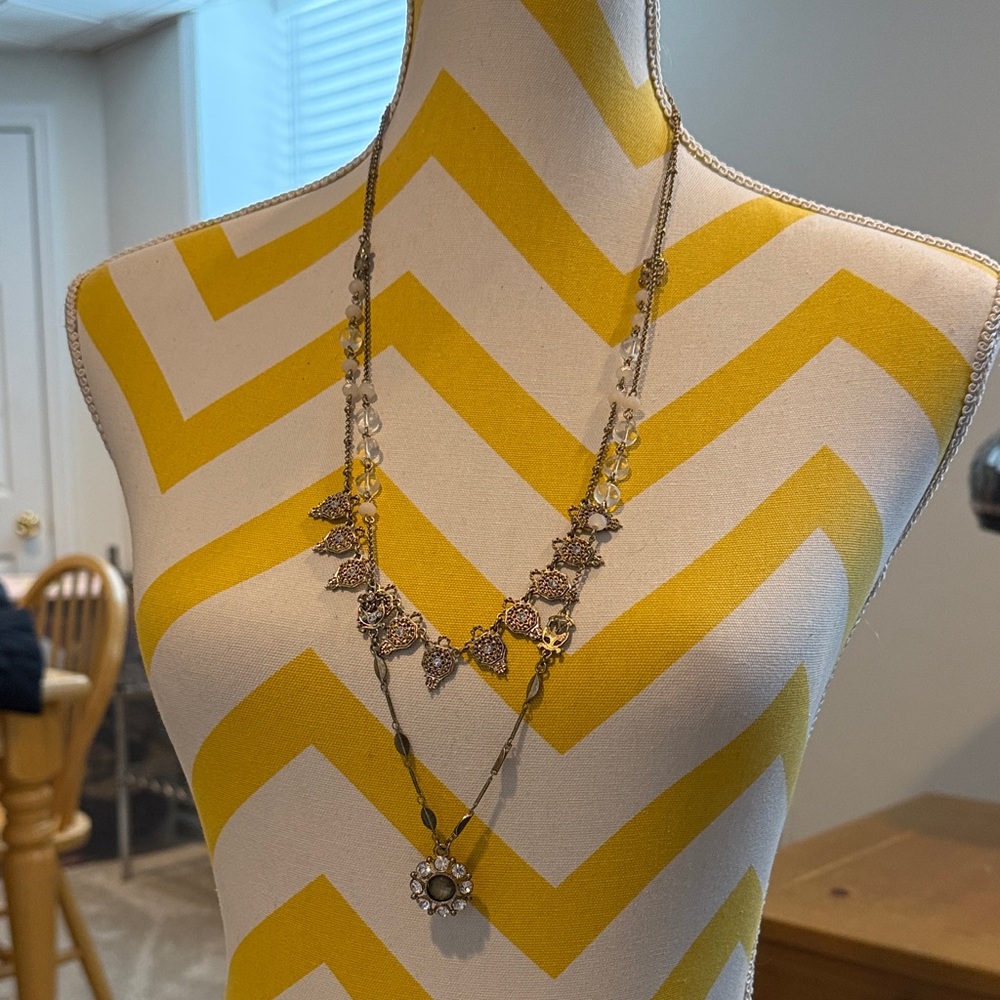 Elegant burnished Necklace with Floral Accents